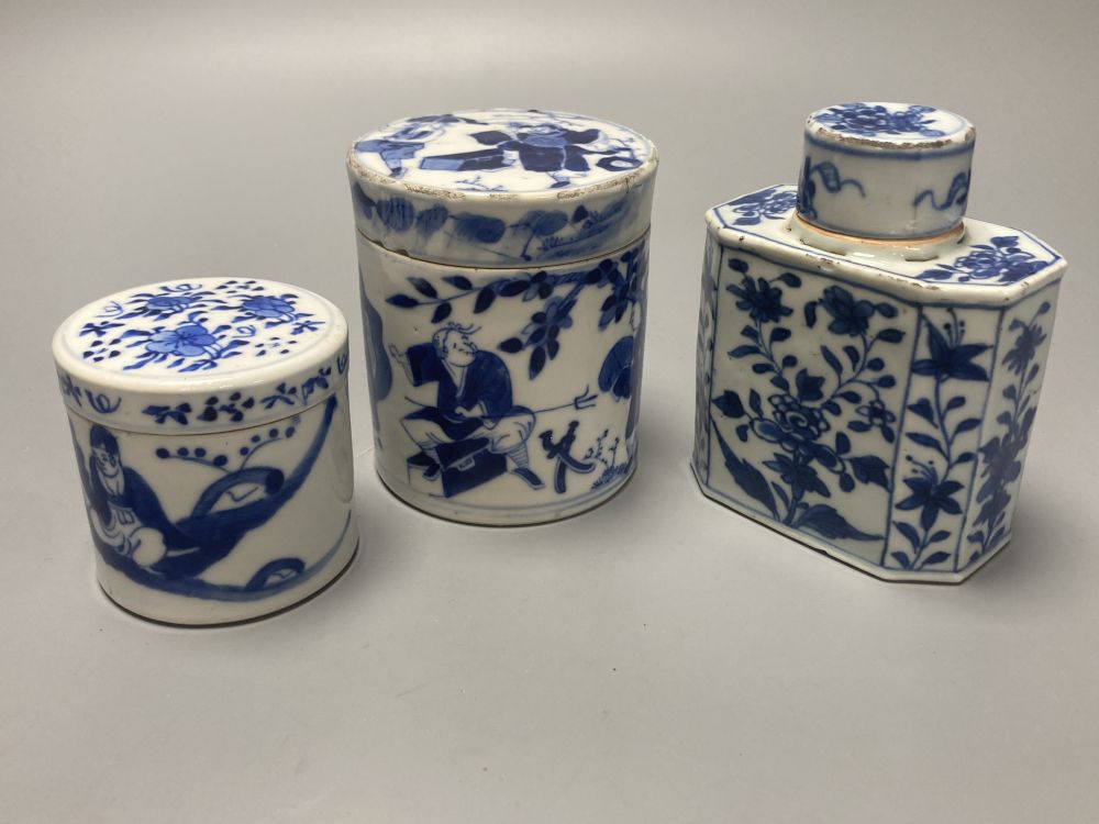 A Chinese blue and white tea canister and cover, Kangxi, 11cm, and two 19th century Chinese blue and white jars and covers